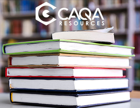 A stack of educational resources represents the support available for vet compliance.