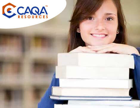 A smiling woman holds books, showcasing CAQA Resources as a trusted provider of vet compliance training.