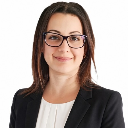 A professional woman, Michelle Newman, is pictured wearing a black blazer.